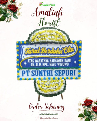 Papan Bunga Duka di Toho