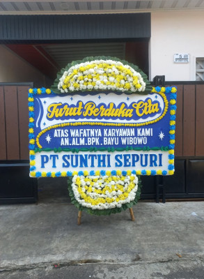Papan Bunga Duka di Toho