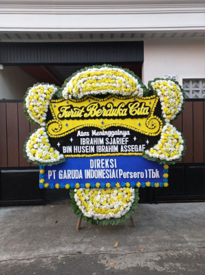 Papan Bunga Duka di Toho