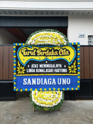 Papan Bunga Duka di Toho