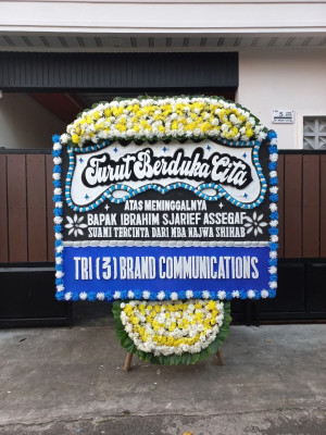 Papan Bunga Duka di Toho